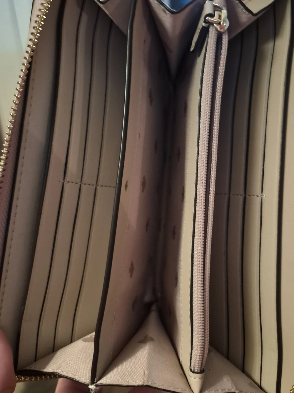 kate spade blush pink wallet with gold logo